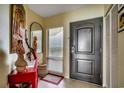 Inviting entryway features a closet, stylish decor, and a modern front door enhancing the home's appeal at 1990 N Waccamaw Dr. # 1008, Murrells Inlet, SC 29576