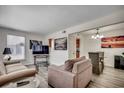 Cozy living room with sofas and a decorative table beneath the television at 2309 Withers Dr. # 6, Myrtle Beach, SC 29577