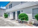 The exterior of the building is white with two doorways and bushes on the side at 2309 Withers Dr. # 7, Myrtle Beach, SC 29577