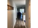 Inviting hallway with wood floors leads to the living area at 4107 Pinehurst Circle # Dd-15, Little River, SC 29566