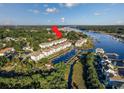 Aerial view of waterfront condos with boat docks at 4430 Eastport Blvd. # L-11, Little River, SC 29566