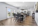 Open dining area with backyard access and adjacent to the kitchen at 5001 Sweet Birch Lane, Conway, SC 29526