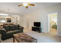 Comfortable living room with couches, marble coffee table, and view to bedroom at 6253 Catalina Dr. # 1523, North Myrtle Beach, SC 29582