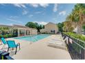 Relax poolside with ample seating and a convenient covered cabana area perfect for gatherings at 702 Beach Walk Pl. # 702, Myrtle Beach, SC 29577