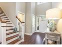 Bright foyer features hardwood floors, staircase, and lots of natural light at 769 Country Club Dr., Pawleys Island, SC 29585