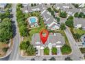 Community aerial view showcasing a pool and clubhouse and well manicured landscaping at 101 Culpepper Way # 1006, Myrtle Beach, SC 29579