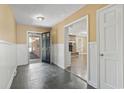 Inviting entryway with tiled floors, leading to an open living space and fireplace at 1043 South Main St., Aynor, SC 29511