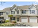 Charming townhome featuring a one car garage and landscaped front yard at 1102 Stanton Pl. # 1102, Myrtle Beach, SC 29579