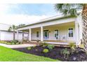 Inviting front porch featuring rocking chairs and a porch swing, perfect for relaxing outdoors at 3718 Highway 931, Conway, SC 29526