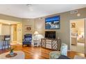 Comfortable living space with stylish furnishings and a view into the bedroom through an open door at 1221 Tidewater Dr. # 2112, North Myrtle Beach, SC 29582