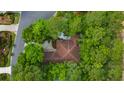 An aerial view showcases the house nestled among the trees at 1325 Clipper Dr., North Myrtle Beach, SC 29582