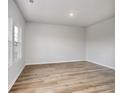 Bright living room featuring wood flooring and lots of natural light at 335 Garden Grove St, Conway, SC 29526