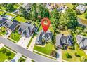 Overhead view of a home with a manicured lawn, mature trees, and convenient location at 3736 Kingsley Dr., Myrtle Beach, SC 29588