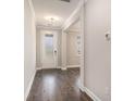 Bright foyer with hardwood floors and a view into other rooms at 8076 Fort Hill Way, Myrtle Beach, SC 29579