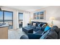 Comfortable living room with beach view and coastal decor at 208 Ocean Blvd. N # 226, North Myrtle Beach, SC 29582