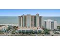 High angle view of the beachfront resort, showcasing the building's architecture and its proximity to the beach at 2301 S Ocean Blvd. # 1418, Myrtle Beach, SC 29577