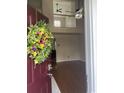 Inviting foyer with hardwood floors and a view of the upper level at 3017 Mercer Dr. # 0, Conway, SC 29526