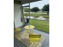 Cozy screened porch with views of a pond and fountain at 3017 Mercer Dr. # 0, Conway, SC 29526
