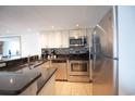 Well-equipped kitchen with stainless steel appliances and bright cabinetry at 4800 S Ocean Blvd. # 504, North Myrtle Beach, SC 29582
