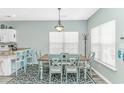 Bright dining area with a table, perfect for Gathering meals and entertaining guests at 6001-1168 S Kings Hwy., Myrtle Beach, SC 29575