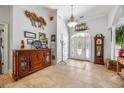 Grand foyer with tile floors, high ceilings, and decorative accents sets an elegant tone at 784 Caines Landing Rd., Conway, SC 29526