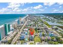 Aerial view of home with ocean view showcasing neighborhood at 113-A Vista Dr., Garden City Beach, SC 29576