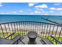 A cozy balcony with ocean views, inviting relaxation with comfortable seating and serene surroundings at 2500 N Ocean Blvd. # 1102, Myrtle Beach, SC 29577