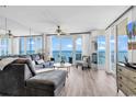 A stylish living room with ocean views and elegant furnishings, creating a comfortable and inviting space at 2500 N Ocean Blvd. # 1102, Myrtle Beach, SC 29577