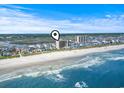 Aerial view of an oceanfront condo with beach access on a sunny day, perfect for relaxing at 4000 N Ocean Blvd. # 506, North Myrtle Beach, SC 29582