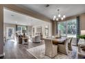 Open-concept living and dining area with hardwood floors and lots of natural light, perfect for gatherings at 4019 Braid Ct., Myrtle Beach, SC 29588