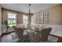 Formal dining room showcasing elegant decor, stylish furniture, and natural light, perfect for gatherings at 4023 Braid Ct., Myrtle Beach, SC 29588