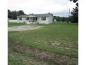 This single story home has a well manicured yard and a gravel driveway at 5578 Dongola Hwy., Conway, SC 29527
