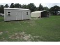 A spacious shed and carport sit in the large backyard at 5578 Dongola Hwy., Conway, SC 29527
