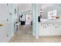 Open-concept floor plan with tiled entryway leading into a living space with vaulted ceilings at 6015 Catalina Dr. # 134, North Myrtle Beach, SC 29582