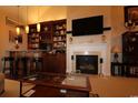 Elegant living room with fireplace, bar area, and TV at 6172 Catalina Dr. # 612, North Myrtle Beach, SC 29582