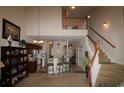 Spacious living room with high ceilings and staircase access at 6172 Catalina Dr. # 612, North Myrtle Beach, SC 29582