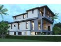 An impressive home with a modern design featuring sharp lines, balconies and an expansive fenced yard at 852 Waterton Ave., Myrtle Beach, SC 29579