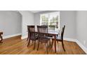 Dining room featuring hardwood floors, natural light and a wooden table at 1155 Palmetto St., Georgetown, SC 29440