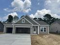 Attractive single-story home with a three car garage and modern design elements at 118 Westfield Circle, Conway, SC 29526