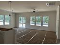Bright, spacious living room with large windows, offering ample natural light at 118 Westfield Circle, Conway, SC 29526