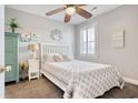 Comfortable bedroom with coastal decor and white wooden furniture at 121 Waypoint Ridge Ave. # P-15, Little River, SC 29566