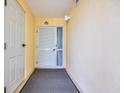 Welcoming condo entrance featuring tile flooring, a white door, and unit number 501 at 135 S Dunes Dr. # 501, Pawleys Island, SC 29585