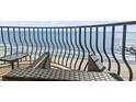 Relaxing ocean view from the condo balcony's outdoor seating at 2500 N Ocean Blvd. # Ph 1, Myrtle Beach, SC 29577
