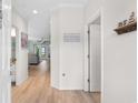 Bright entryway leading to a living space, featuring stylish decor and a welcoming Beach House theme at 411 Mahogany Dr. # 101, Murrells Inlet, SC 29576