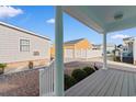 View from front porch to the backyard and detached garage at 613B 3Rd Ave. S, North Myrtle Beach, SC 29582