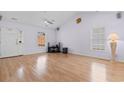 Spacious living room with hardwood floors and vaulted ceiling at 613B 3Rd Ave. S, North Myrtle Beach, SC 29582