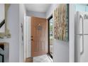 Bright entryway showcasing an open door and decor, creating a welcoming atmosphere at 614 15Th Ave. S # 41, Surfside Beach, SC 29575