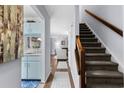 Spacious hallway leading to kitchen, living area, and staircase, providing a seamless flow at 614 15Th Ave. S # 41, Surfside Beach, SC 29575