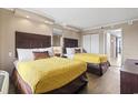 Inviting bedroom featuring two comfortable beds, neutral walls, and ample closet space at 6900 North Ocean Blvd. # 938, Myrtle Beach, SC 29572