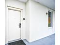 The condo unit features an exterior front entrance with a door and exterior wall details at 8121 Amalfi Pl. # 7-805, Myrtle Beach, SC 29572